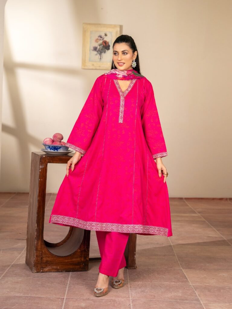 Woman wearing JZARYA’s elegant Pakistani dress – premium ladies’ clothing online.